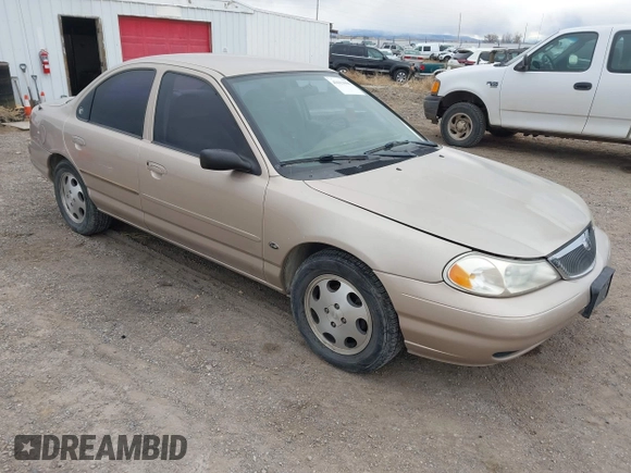 1999 Mercury Mystique GS z VIN 1MEFM6538XK606647, wystawiony jako IAAI lot #41613999 z przebiegiem 90 978 mil mil oraz . Historia ofert i sprzedaży dostępna na DreamBid. Obrazek 1.