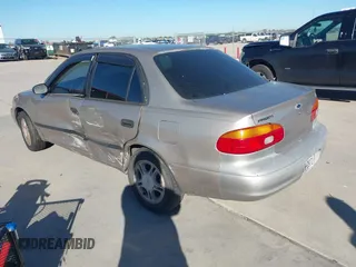 2001 Chevrolet Prizm with VIN 1Y1SK54811Z411948, listed as a IAAI auction lot 40874344 with 1 mi miles. Bid and sale history available at carsss.com. Image 3.