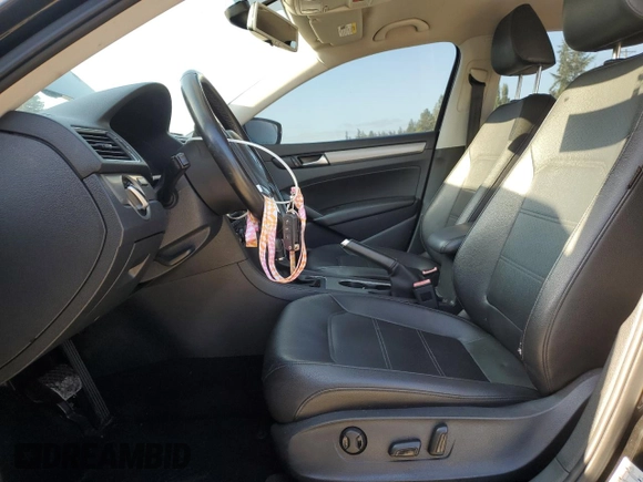 2014 Volkswagen Passat SE with VIN 1VWBT7A34EC107881, listed as a Copart auction lot 65431345 with 106,432 mi miles and Salvage title. Bid and sale history available at DreamBid. Image 7.
