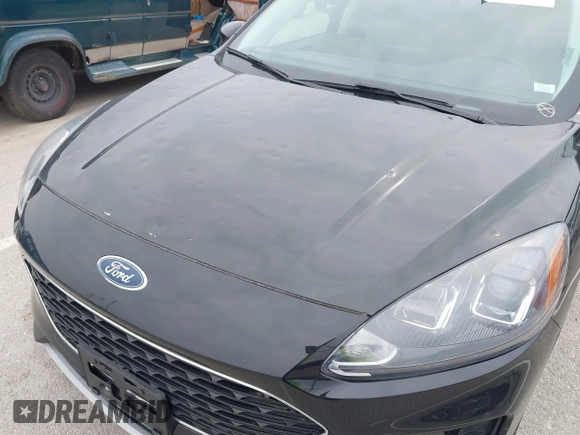 2021 Ford Escape SE z VIN 1FMCU9G6XMUA27362, wystawiony jako IAAI lot #42438771 z przebiegiem 36 040 mil mil oraz . Historia ofert i sprzedaży dostępna na DreamBid. Obrazek 6.