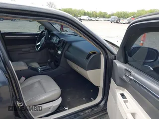 2006 Chrysler 300 Touring with VIN 2C3KA53G36H220558, listed as a IAAI auction lot 42159373 with 158,970 mi miles. Bid and sale history available at carsss.com. Image 5.