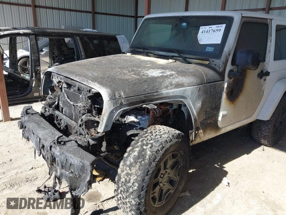 2015 Jeep Wrangler Altitude z VIN 1C4GJWBG2FL714146, wystawiony jako IAAI lot #41417659 z przebiegiem Nie podano mil oraz . Historia ofert i sprzedaży dostępna na DreamBid. Obrazek 6.