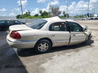 2000 Lincoln Continental with VIN 1LNHM97V5YY785721, listed as a Copart auction lot 57934824 with 0 mi miles and Non Repairable. Bid and sale history available at carsss.com. Image 3.
