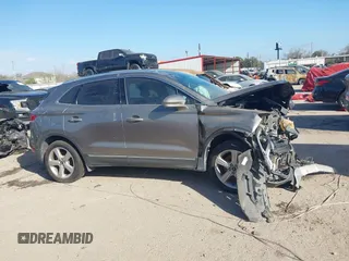 2017 Lincoln MKC Premiere with VIN 5LMCJ1D92HUL71022, listed as a IAAI auction lot 38628790 with 141,930 mi miles. Bid and sale history available at carsss.com. Image 13.
