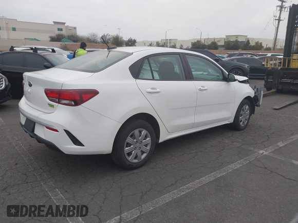 2021 Kia Rio LX with VIN 3KPA24AD3ME422560, listed as a IAAI auction lot 41005730 with 59,206 mi miles. Bid and sale history available at carsss.com. Image 4.