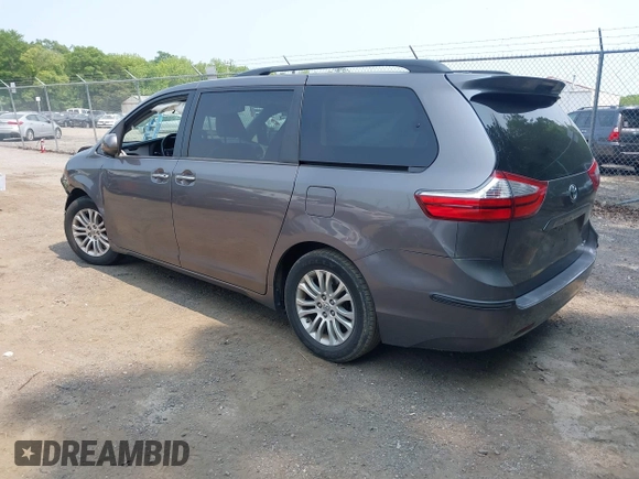 2015 Toyota Sienna XLE with VIN 5TDYK3DC6FS553695, listed as a IAAI auction lot 42418507 with 137,677 mi miles and . Bid and sale history available at DreamBid. Image 3.
