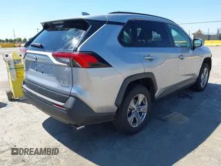 2022 Toyota RAV4 Hybrid XLE with VIN 4T3RWRFV2NU066761, listed as a IAAI auction lot 42784621 with 24,711 mi miles and . Bid and sale history available at DreamBid. Image 4.