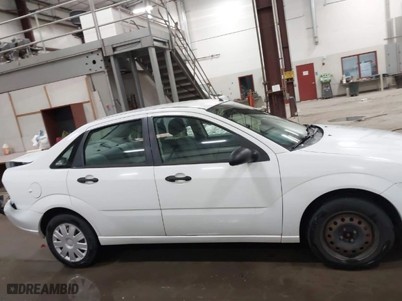2005 Ford Focus S with VIN 1FAFP34N35W158677, listed as a IAAI auction lot 41911027 with 93,894 mi miles. Bid and sale history available at carsss.com. Image 13.