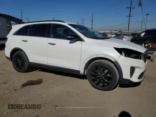 2019 Kia Sorento S with VIN 5XYPG4A51KG601460, listed as a Copart auction lot 80128124 with 34,719 mi miles and Salvage Title. Bid and sale history available at DreamBid. Image 4.