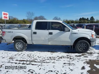 2014 Ford F-150 XL with VIN 1FTFW1EF5EFA45595, listed as a IAAI auction lot 41535410 with 124,208 mi miles. Bid and sale history available at carsss.com. Image 13.