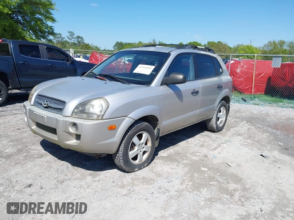2006 Hyundai Tucson GL with VIN KM8JM12BX6U249982, listed as a IAAI auction lot 41976033 with 107,153 mi miles. Bid and sale history available at carsss.com. Image 18.