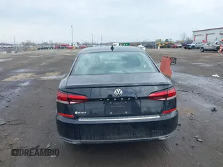 2021 Volkswagen Passat SE z VIN 1VWSA7A36MC014185, wystawiony jako IAAI lot #41915701 z przebiegiem 175 043 mil mil oraz . Historia ofert i sprzedaży dostępna na DreamBid. Obrazek 16.