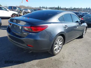 2016 Mazda 6 i Sport with VIN JM1GJ1U53G1400940, listed as a IAAI auction lot 41687400 with 77,737 mi miles and . Bid and sale history available at DreamBid. Image 4.