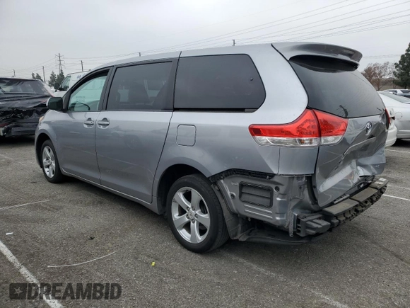 2012 Toyota Sienna with VIN 5TDKA3DC4CS014867, listed as a Copart auction lot 43191655 with 169,517 mi miles and Salvage Title. Bid and sale history available at DreamBid. Image 2.