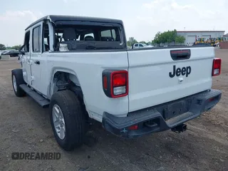 2023 Jeep Gladiator Sport S with VIN 1C6HJTAG3PL532694, listed as a IAAI auction lot 42446863 with 40,525 mi miles and . Bid and sale history available at DreamBid. Image 3.