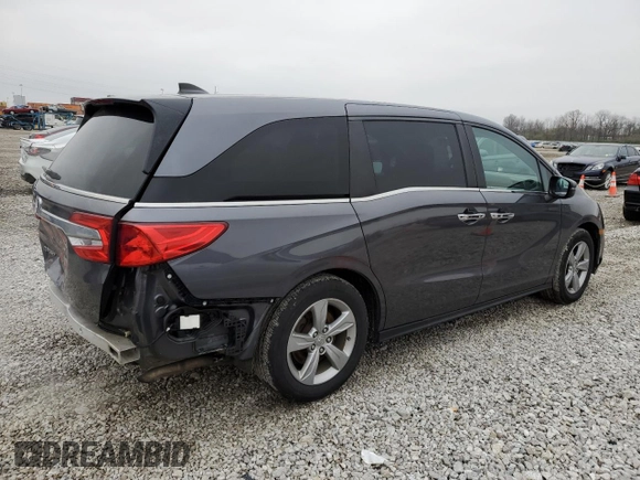 2018 Honda Odyssey EX-L with VIN 5FNRL6H78JB091153, listed as a Copart auction lot 52743715 with 69,849 mi miles and Salvage Title. Bid and sale history available at DreamBid. Image 3.