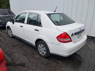 2009 Nissan Versa 1.6 with VIN 3N1CC11EX9L423580, listed as a IAAI auction lot 40466818 with 144,019 mi miles and . Bid and sale history available at DreamBid. Image 3.