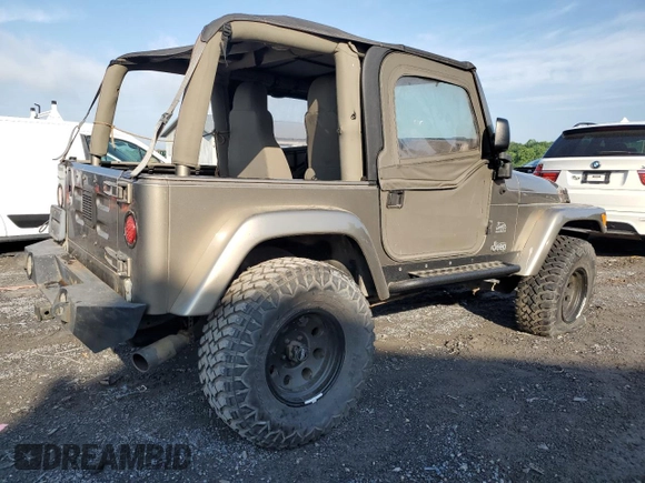 2003 Jeep Wrangler Sahara with VIN 1J4FA59S83P318057, listed as a Copart auction lot 58781495 with 102,571 mi miles and Clean title. Bid and sale history available at DreamBid. Image 3.
