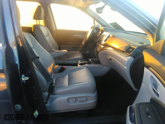 2016 Honda Pilot EX-L with VIN 5FNYF5H56GB052226, listed as a IAAI auction lot 39296292 with 33,056 mi miles and . Bid and sale history available at DreamBid. Image 5.