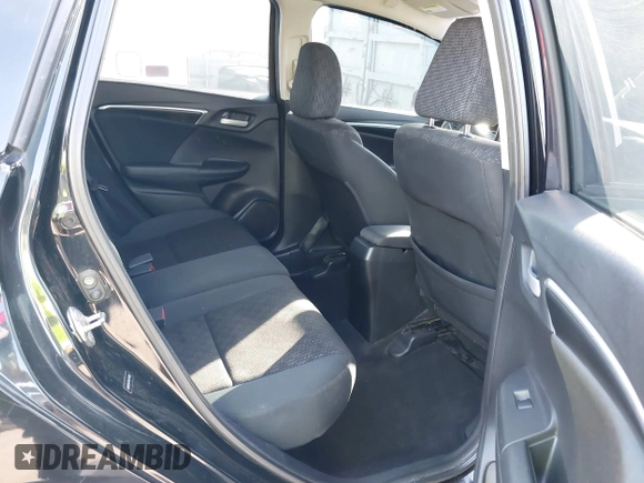 2015 Honda Fit LX z VIN 3HGGK5H57FM717203, wystawiony jako IAAI lot #41615075 z przebiegiem 99 933 mil mil oraz . Historia ofert i sprzedaży dostępna na DreamBid. Obrazek 8.