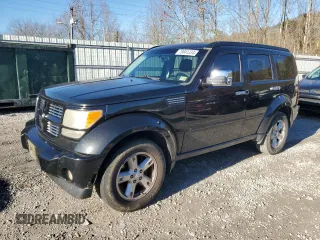 2011 Dodge Nitro SXT with VIN 1D4PU5GK5BW575754, listed as a Copart auction lot 79841234 with 246,589 mi miles and Salvage Title. Bid and sale history available at DreamBid. Image 1.