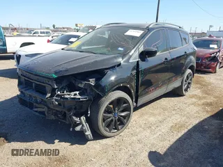2018 Ford Escape SE z VIN 1FMCU9GD3JUC75754, wystawiony jako IAAI lot #41761965 z przebiegiem 101 771 mil mil oraz . Historia ofert i sprzedaży dostępna na DreamBid. Obrazek 17.