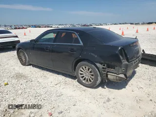 2014 Chrysler 300 with VIN 2C3CCAAG4EH100812, listed as a Copart auction lot 52641955 with 135,337 mi miles and Salvage Title. Bid and sale history available at carsss.com. Image 2.