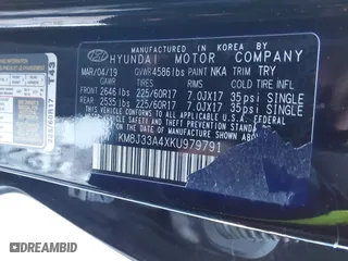 2019 Hyundai Tucson Value with VIN KM8J33A4XKU979791, listed as a IAAI auction lot 41255630 with 90,807 mi miles. Bid and sale history available at carsss.com. Image 9.