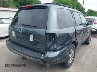 2005 Honda Pilot EX-L with VIN 5FNYF18565B046464, listed as a IAAI auction lot 41879495 with 228,021 mi miles. Bid and sale history available at carsss.com. Image 4.