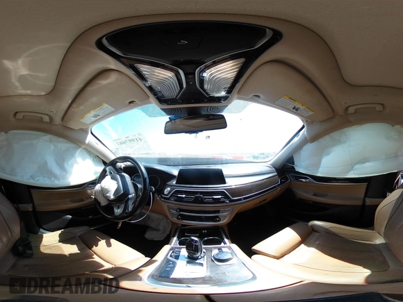 2017 BMW 7 Series 740i xDrive with VIN WBA7E4C50HGU99106, listed as a IAAI auction lot 41997603 with 138,322 mi miles. Bid and sale history available at carsss.com. Image 18.