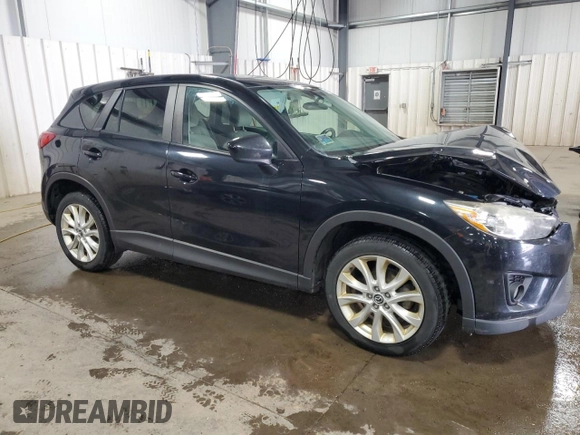 2014 Mazda CX-5 Grand Touring with VIN JM3KE4DY0E0322606, listed as a Copart auction lot 54381815 with 216,022 mi miles and Salvage Title. Bid and sale history available at DreamBid. Image 4.