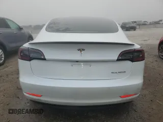 2021 Tesla Model 3 Performance with VIN 5YJ3E1ECXMF984417, listed as a Copart auction lot 48465675 with 60,838 mi miles and Clean Title. Bid and sale history available at DreamBid. Image 6.
