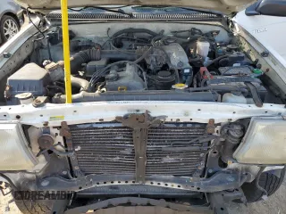 1999 Toyota Tacoma with VIN 4TAPM62N8XZ457624, listed as a Copart auction lot 71565904 with 133,851 mi miles and Salvage Title. Bid and sale history available at DreamBid. Image 11.