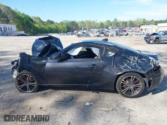 2015 Scion FR-S with VIN JF1ZNAA10F8707671, listed as a IAAI auction lot 42000130 with 136,734 mi miles. Bid and sale history available at carsss.com. Image 14.