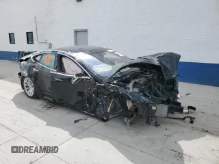 2016 Tesla Model S 90D with VIN 5YJSA1E23GF167938, listed as a Copart auction lot 51703075 with Not provided miles and Salvage title. Bid and sale history available at DreamBid. Image 4.