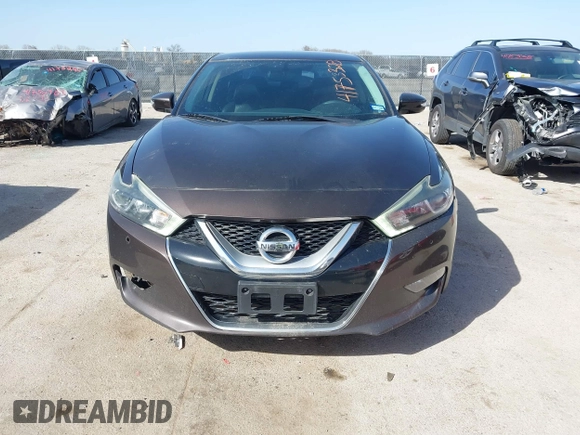 2016 Nissan Maxima Platinum with VIN 1N4AA6AP2GC385723, listed as a IAAI auction lot 41753328 with 162,845 mi miles and . Bid and sale history available at DreamBid. Image 12.