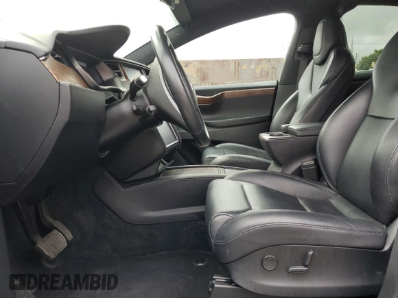 2018 Tesla Model X 75D with VIN 5YJXCBE24JF130216, listed as a Copart auction lot 48894215 with 75,694 mi miles and Salvage Title. Bid and sale history available at carsss.com. Image 7.