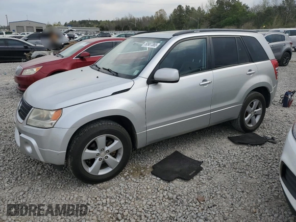 2010 Suzuki Grand Vitara Limited z VIN JS3TE0D73A4100112, wystawiony jako Copart lot #50907365 z przebiegiem 146 484 mil mil oraz Szkoda całkowita • Salvage title. Historia ofert i sprzedaży dostępna na DreamBid. Obrazek 1.