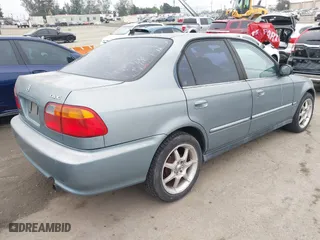 2000 Honda Civic VP with VIN 2HGEJ6613YH573635, listed as a IAAI auction lot 42099695 with 235,772 mi miles. Bid and sale history available at carsss.com. Image 4.
