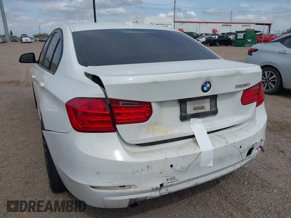2015 BMW 3 Series 328i with VIN WBA3A5G55FNS85277, listed as a IAAI auction lot 41593498 with 128,265 mi miles and . Bid and sale history available at carsss.com. Image 3.