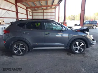 2018 Hyundai Tucson Value with VIN KM8J3CA20JU762120, listed as a IAAI auction lot 41878796 with 103,346 mi miles. Bid and sale history available at carsss.com. Image 13.