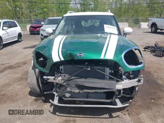 2024 MINI Countryman Cooper S z VIN WMZ83BR07R3S15220, wystawiony jako IAAI lot #42169179 z przebiegiem 18 900 mil mil oraz . Historia ofert i sprzedaży dostępna na DreamBid. Obrazek 6.
