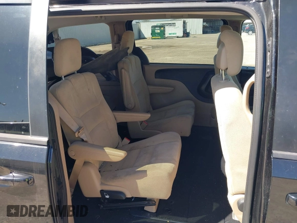 2016 Dodge Grand Caravan SXT with VIN 2C4RDGCG0GR387856, listed as a IAAI auction lot 41769163 with 103,856 mi miles and . Bid and sale history available at DreamBid. Image 8.