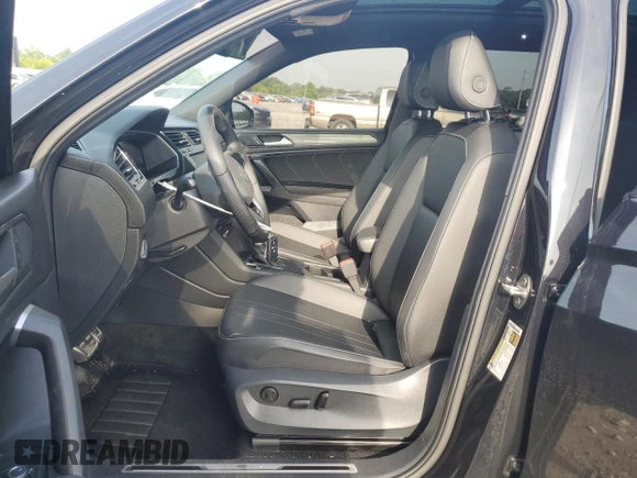2024 Volkswagen Tiguan SE R-Line Black with VIN 3VVCB7AX9RM000859, listed as a Copart auction lot 59664795 with 35,569 mi miles and Salvage title. Bid and sale history available at DreamBid. Image 7.