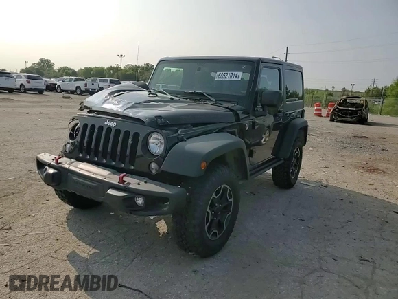 2015 Jeep Wrangler Rubicon Hard Rock z VIN 1C4BJWCG9FL714606, wystawiony jako Copart lot #68521014 z przebiegiem 35 187 mil mil oraz Szkoda całkowita • Salvage title. Historia ofert i sprzedaży dostępna na DreamBid. Obrazek 11.
