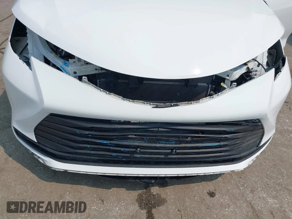2022 Toyota Sienna LE z VIN 5TDBRKEC0NS087867, wystawiony jako IAAI lot #42332549 z przebiegiem 52 551 mil mil oraz . Historia ofert i sprzedaży dostępna na DreamBid. Obrazek 6.