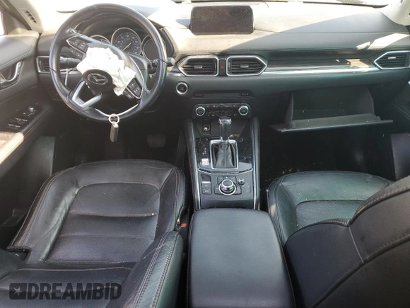 2018 Mazda CX-5 Grand Touring с VIN JM3KFBDM5J0323923, выставлен на аукционе Copart как лот 58162435 с пробегом 144 792 миль миль и Списание • Salvage title. История ставок и продаж доступна на DreamBid. Изображение 8.