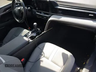 2025 Toyota Camry LE with VIN 4T1DAACK6SU029608, listed as a IAAI auction lot 41571751 with 9,030 mi miles and . Bid and sale history available at DreamBid. Image 5.