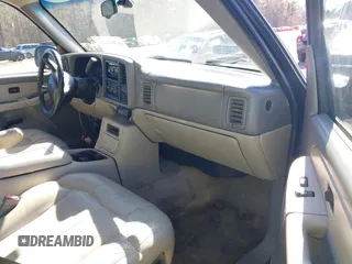 2002 Chevrolet Suburban Z71 with VIN 3GNFK16Z52G264577, listed as a IAAI auction lot 41581984 with 321,321 mi miles. Bid and sale history available at carsss.com. Image 5.