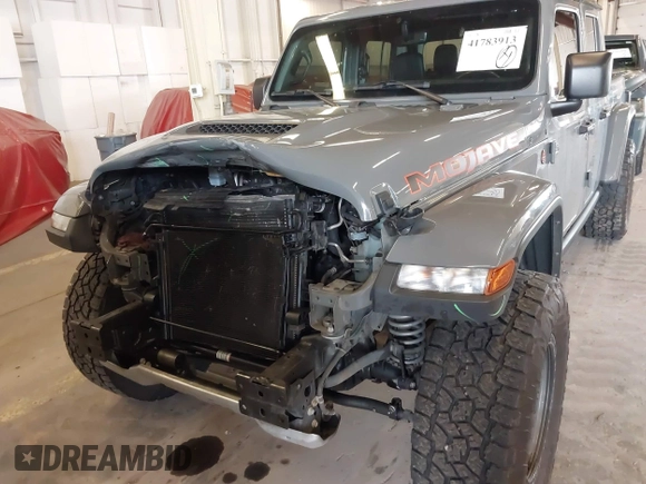 2021 Jeep Gladiator Mojave with VIN 1C6JJTEG1ML596109, listed as a IAAI auction lot 41783913 with 71,112 mi miles and . Bid and sale history available at DreamBid. Image 6.